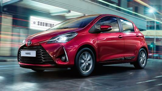 red coloured Toyota Vehicle.jpeg